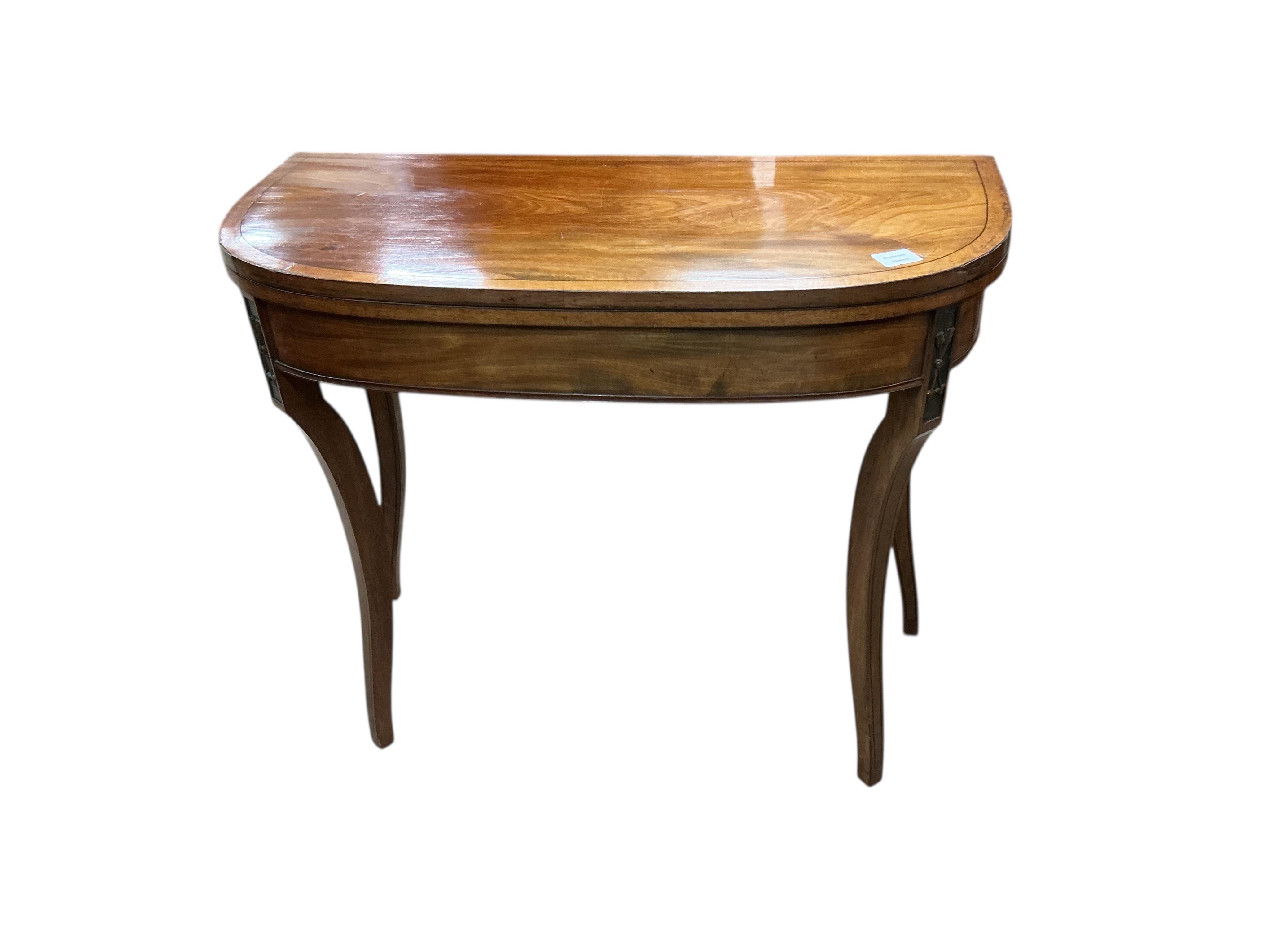 A Regency mahogany D shaped folding card table, width 92cm, depth 45cm, height 74cm